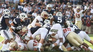 PROVO, UT. - SEPTEMBER 19: Brigham Young Cougars players go for the fumbled football against the Florida State Seminoles at La Vell Edwards Stadium on September 19, 2009 in Provo, Utah. (Photo by Melissa Majchrzak/Getty Images)