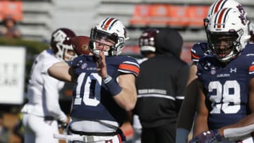 Dec 5, 2020; Auburn, Alabama, USA; Auburn Tigers quarterback Bo Nix (10) warms up before the game against the Texas A&M Aggies at Jordan-Hare Stadium. Mandatory Credit: John Reed-USA TODAY Sports