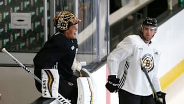 BOSTON - SEPTEMBER 4: Boston Bruins goalie Tuukka Rask, left, laughs as he jokes with Bruins' Danton Heinen during captain's practice at Warrior Ice Arena in the Brighton neighborhood of Boston on Sep. 4, 2019. (Photo by Jessica Rinaldi/The Boston Globe via Getty Images)