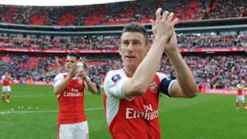 LONDON, ENGLAND - APRIL 23: Arsenal captain Laurent Koscielny applauds the fans after the Emirates FA Cup Semi-Final match between Arsenal and Manchester City at Wembley Stadium on April 23, 2017 in London, England. (Photo by Stuart MacFarlane/Arsenal FC via Getty Images)