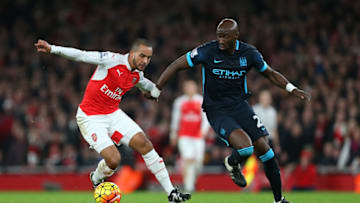 LONDON, ENGLAND - DECEMBER 21: Theo Walcott of Arsenal and Eliaquim Mangala of Manchester City during the Barclays Premier League match between Arsenal and Manchester City at the Emirates Stadium on December 21, 2015 in London, England. (Photo by Catherine Ivill - AMA/Getty Images)