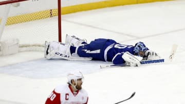 Dec 20, 2016; Tampa, FL, USA; Tampa Bay Lightning goalie Ben Bishop (30) falls to the ice after an apparent injury against the Detroit Red Wings during the first period at Amalie Arena. Mandatory Credit: Kim Klement-USA TODAY Sports