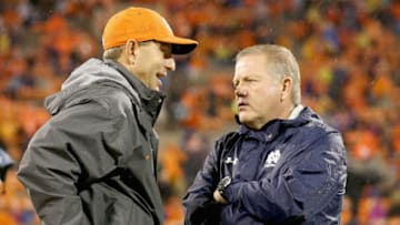 CLEMSON, SC - OCTOBER 03: (L-R) Head coach Dabo Swinney of the Clemson Tigers talks to head coach Brian Kelly of the Notre Dame Fighting Irish before their game at Clemson Memorial Stadium on October 3, 2015 in Clemson, South Carolina. (Photo by Streeter Lecka/Getty Images)