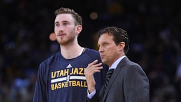 November 21, 2014; Oakland, CA, USA; Utah Jazz head coach Quin Snyder (front) instructs forward Gordon Hayward (20, back) during the third quarter against the Golden State Warriors at Oracle Arena. The Warriors defeated the Jazz 101-88. Mandatory Credit: Kyle Terada-USA TODAY Sports