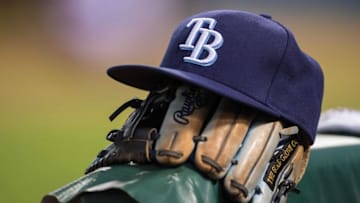 Aug 15, 2015; Arlington, TX, USA; A view of a Tampa Bay Rays ball cap and glove during the game between the Texas Rangers and the Tampa Bay Rays at Globe Life Park in Arlington. The Rangers defeated the Rays 12-4. Mandatory Credit: Jerome Miron-USA TODAY Sports