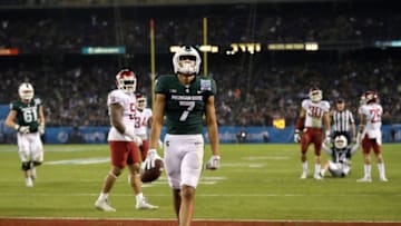 SAN DIEGO, CA - DECEMBER 28: Cody White #7 of the Michigan State Spartans looks on after scoring on a pass play against the Washington State Cougars during the second half of the SDCCU Holiday Bowl at SDCCU Stadium on December 28, 2017 in San Diego, California. (Photo by Sean M. Haffey/Getty Images)