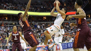 Mar 10, 2016; Washington, DC, USA; Miami Hurricanes guard Angel Rodriguez (13) shoots as Virginia Tech Hokies forward Zach LeDay (32) defends in the first half during day three of the ACC conference tournament at Verizon Center. Mandatory Credit: Tommy Gilligan-USA TODAY Sports