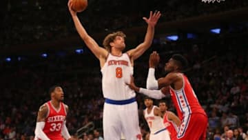 Jan 18, 2016; New York, NY, USA; New York Knicks center Robin Lopez (8) puts a shot over Philadelphia 76ers forward Nerlens Noel (4) during the fourth quarter at Madison Square Garden. New York Knicks won 119-113 in double overtime. Mandatory Credit: Anthony Gruppuso-USA TODAY Sports