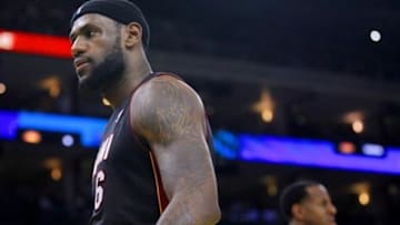 Feb 12, 2014; Oakland, CA, USA; Miami Heat forward LeBron James (6) reacts after scoring a basket against the Golden State Warriors in the second quarter at Oracle Arena. Mandatory Credit: Cary Edmondson-USA TODAY Sports