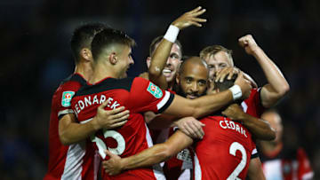 PORTSMOUTH, ENGLAND - SEPTEMBER 24: Cedric Soares of Southampton(back) celebrates after scoring his sides third goal during the Carabao Cup Third Round match between Portsmouth and Southampton at Fratton Park on September 24, 2019 in Portsmouth, England. (Photo by Dan Istitene/Getty Images)