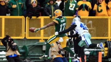 Jan 11, 2015; Green Bay, WI, USA; Green Bay Packers wide receiver Davante Adams (17) gets past Dallas Cowboys strong safety Barry Church (42) to score a touchdown in the third quarter in the 2014 NFC Divisional playoff football game at Lambeau Field. Mandatory Credit: Andrew Weber-USA TODAY Sports