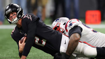 ATLANTA, GEORGIA - NOVEMBER 18: Davon Godchaux #92 of the New England Patriots sacks Matt Ryan #2 of the Atlanta Falcons (Photo by Kevin C. Cox/Getty Images)