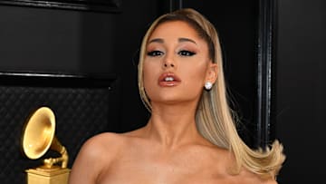 Fans reacted after Ariana Grande appeared to like a tweet shading Kendall Jenner.