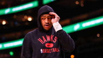 ATLANTA, GA - FEBRUARY 11: John Collins #20 of the Atlanta Hawks warms up before a game against the San Antonio Spurs at State Farm Arena on February 11, 2022 in Atlanta, Georgia. NOTE TO USER: User expressly acknowledges and agrees that, by downloading and or using this photograph, User is consenting to the terms and conditions of the Getty Images License Agreement. (Photo by Casey Sykes/Getty Images)