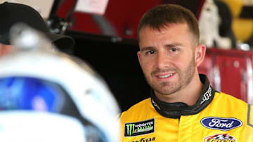 DAYTONA BEACH, FL - FEBRUARY 10: Matt DiBenedetto, driver of the #32 The Hurricane Heist Ford, stands in the garage during practice for the Monster Energy NASCAR Cup Series Daytona 500 at Daytona International Speedway on February 10, 2018 in Daytona Beach, Florida. (Photo by Jerry Markland/Getty Images)