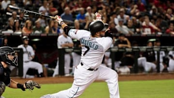 Sep 30, 2016; Phoenix, AZ, USA; Arizona Diamondbacks catcher Welington Castillo (7) hits an RBI single in the first inning against the San Diego Padres at Chase Field. Mandatory Credit: Matt Kartozian-USA TODAY Sports