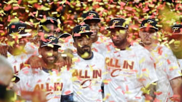 May 26, 2015; Cleveland, OH, USA; Cleveland Cavaliers guard Kyrie Irving (2), guard J.R. Smith (5) and forward LeBron James (23) celebrates beating the Atlanta Hawks in game four of the Eastern Conference Finals of the NBA Playoffs at Quicken Loans Arena. Mandatory Credit: Ken Blaze-USA TODAY Sports