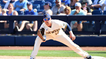 MARYVALE, ARIZONA - MARCH 06: Justin Smoak #12 of the Milwaukee Brewers catches a throw while covering first base during a spring training game against the San Francisco Giants at American Family Fields of Phoenix on March 06, 2020 in Maryvale, Arizona. (Photo by Norm Hall/Getty Images)
