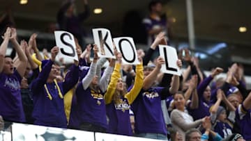MINNEAPOLIS, MN - DECEMBER 17: Fans hold up signs spelling 'SKOL' in the third quarter of the game against the Cincinnati Bengals on December 17, 2017 at U.S. Bank Stadium in Minneapolis, Minnesota. (Photo by Hannah Foslien/Getty Images)