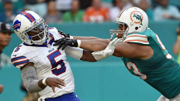 Oct 23, 2016; Miami Gardens, FL, USA; Miami Dolphins defensive tackle Ndamukong Suh (93) pushes Buffalo Bills quarterback Tyrod Taylor (5) during the second half at Hard Rock Stadium. The Dolphins won 28-25. Mandatory Credit: Steve Mitchell-USA TODAY Sports