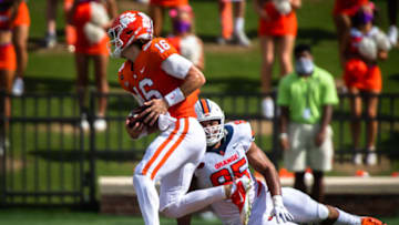 Oct 24, 2020; Clemson, South Carolina, USA; Clemson quarterback Trevor Lawrence (16) runs the ball during their game against Syracuse at Memorial Stadium. Mandatory Credit: Ken Ruinard-USA TODAY Sports