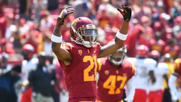 LOS ANGELES, CA - SEPTEMBER 01: USC (21) Isaiah Pola-Mao (S) celebrates a tackle during a college football game between the UNLV Rebels and the USC Trojans on September 1, 2018, at Los Angeles Memorial Coliseum in Los Angeles, CA. (Photo by Brian Rothmuller/Icon Sportswire via Getty Images)