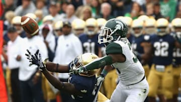 SOUTH BEND, IN - SEPTEMBER 21: Darqueze Dennard #31 of the Michigan State Spartans breaks up a pass intended for DeVarius Daniels #10 of the Notre Dame Fighting Irish at Notre Dame Stadium on September 21, 2013 in South Bend, Indiana. Notre Dame defeated Michigan State 17-13. (Photo by Jonathan Daniel/Getty Images)