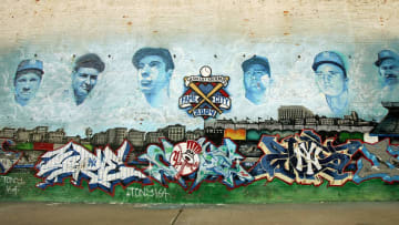 NEW YORK - OCTOBER 03: (L-R) A mural of former New York Yankees Babe Ruth, Lou Gehrig, Joe DiMaggio, Mickey Mantle, Roger Maris, Thurman Munson shown outside of Yankee Stadium prior to game one of the American League Division Series against the Detroit Tigers on October 3, 2006 at Yankee Stadium in the Bronx Borough of New York City. (Photo by Al Bello/Getty Images)