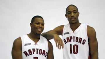Sep 29, 2014; Toronto, Ontario, CAN; Toronto Raptors guards Kyle Lowry (7) and Demar DeRozan (10) during Raptors Media Day at The Real Sports Bar Toronto. Mandatory Credit: Peter Llewellyn-USA TODAY Sports