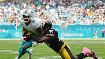 Oct 16, 2016; Miami Gardens, FL, USA; Pittsburgh Steelers inside linebacker Vince Williams (98) tackles Miami Dolphins wide receiver Kenny Stills (10) during the first half at Hard Rock Stadium. Mandatory Credit: Jasen Vinlove-USA TODAY Sports