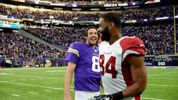MINNEAPOLIS, MN - NOVEMBER 20: Sam Bradford #8 of the Minnesota Vikings and Jermaine Gresham #84 of the Arizona Cardinals speak after the game on November 20, 2016 at US Bank Stadium in Minneapolis, Minnesota. The Vikings defeated the Cardinals 30-24. (Photo by Hannah Foslien/Getty Images)
