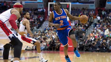 Jan 7, 2015; Washington, DC, USA; New York Knicks guard Langston Galloway (2) looks to pass as Washington Wizards forward Drew Gooden (90) defends during the fourth quarter at Verizon Center. Washington Wizards defeated New York Knicks 101-91. Mandatory Credit: Tommy Gilligan-USA TODAY Sports