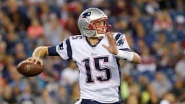 Aug 15, 2014; Foxborough, MA, USA; New England Patriots quarterback Ryan Mallett (15) throws a pass against the Philadelphia Eagles in the second half during the preseason game at Gillette Stadium. The New England Patriots defeated the Philadelphia Eagles 42-35. Mandatory Credit: David Butler II-USA TODAY Sports