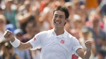 Sep 6, 2014; New York, NY, USA; Kei Nishikori (JPN) celebrates recording match point in his match against Novak Djokovic (SRB) on day thirteen of the 2014 U.S. Open tennis tournament at USTA Billie Jean King National Tennis Center. Mandatory Credit: Susan Mullane-USA TODAY Sports