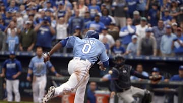 Apr 10, 2016; Kansas City, MO, USA; Kansas City Royals pinch runner Terrance Gore (0) scores from third base on a wild pitch in the tenth inning against the Minesota Twins at Kauffman Stadium. Kansas City won the game 4-3. Mandatory Credit: John Rieger-USA TODAY Sports