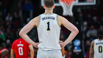 CHICAGO, ILLINOIS - MARCH 09: Hunter Dickinson #1 of the Michigan Wolverines is seen watching a free throw during the second half of a Big Ten Men's Basketball Tournament Second Round game against the Rutgers Scarlet Knights at United Center on March 09, 2023 in Chicago, Illinois. The Rutgers Scarlet Knights won the game 62-50 over the Michigan Wolverines. (Photo by Aaron J. Thornton/Getty Images)