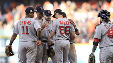 HOUSTON, TX - OCTOBER 05: The Boston Red Sox talk to Joe Kelly