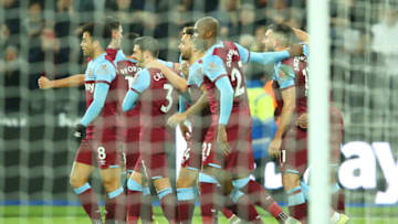 LONDON, ENGLAND - JANUARY 01: Mark Noble of West Ham United (obscure) celebrates with his team mates after scoring his team's third goal during the Premier League match between West Ham United and AFC Bournemouth at London Stadium on January 01, 2020 in London, United Kingdom. (Photo by Warren Little/Getty Images)