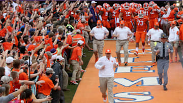 CLEMSON, SC - NOVEMBER 07: Dabo Swinney of the Clemson Tigers runs to the field during their game at Memorial Stadium on November 7, 2015 in Clemson, South Carolina. (Photo by Streeter Lecka/Getty Images)