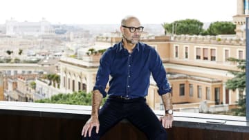 Stanley Tucci feels right at home being photographed at Rome's Hotel Eden.
