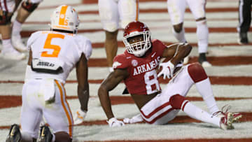 Nov 7, 2020; Fayetteville, Arkansas, USA; Arkansas Razorbacks wide receiver Mike Woods (8) scores a touchdown against the Tennessee Volunteers at Donald W. Reynolds Razorback Stadium. Arkansas won 24-13. Mandatory Credit: Nelson Chenault-USA TODAY Sports