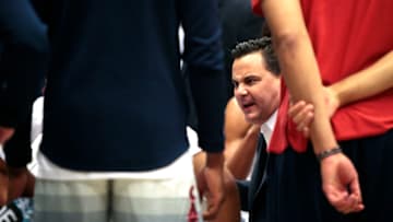 PULLMAN, WASHINGTON - FEBRUARY 01: Head coach Sean Miller of the Arizona Wildcats huddles with his players during a timeout in the first half against the Washington State Cougars at Beasley Coliseum on February 01, 2020 in Pullman, Washington. (Photo by William Mancebo/Getty Images)