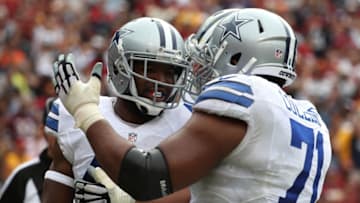 LANDOVER, MD - SEPTEMBER 18: Running back Alfred Morris #46 of the Dallas Cowboys celebrates with teammate offensive guard La'el Collins #71 after scoring a fourth quarter touchdown against the Washington Redskins at FedExField on September 18, 2016 in Landover, Maryland. (Photo by Rob Carr/Getty Images)