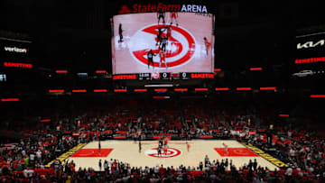 ATLANTA, GEORGIA - APRIL 22: A general view as Bam Adebayo #13 of the Miami Heat and John Collins #20 of the Atlanta Hawks tip off Game Three of the Eastern Conference First Round at State Farm Arena on April 22, 2022 in Atlanta, Georgia. NOTE TO USER: User expressly acknowledges and agrees that, by downloading and or using this photograph, User is consenting to the terms and conditions of the Getty Images License Agreement. (Photo by Kevin C. Cox/Getty Images)