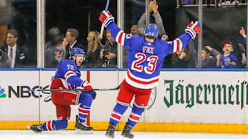 NEW YORK, NY - OCTOBER 29: New York Rangers center Filip Chytil (72) celebrates goal as New York Rangers defenseman Adam Fox (23) congratulates him during the Tampa Bay Lightning and New York Rangers NHL game on October 29, 2019, at Madison Square Garden in New York, NY. (Photo by John Crouch/Icon Sportswire via Getty Images)