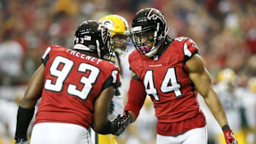 Oct 30, 2016; Atlanta, GA, USA; Atlanta Falcons outside linebacker Vic Beasley (44) celebrates a sack with defensive end Dwight Freeney (93) against the Green Bay Packers in the second quarter at the Georgia Dome. Mandatory Credit: Brett Davis-USA TODAY Sports
