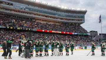 Feb 21, 2016; Minneapolis, MN, USA; The Minnesota Wild celebrate following a Stadium Series hockey game against the Chicago Blackhawks at TCF Bank Stadium. The Wild defeated the Blackhawks 6-1. Mandatory Credit: Brace Hemmelgarn-USA TODAY Sports