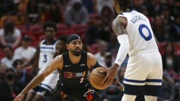 Miami Heat guard Gabe Vincent (2) covers Minnesota Timberwolves guard D'Angelo Russell (0)(Sam Navarro-USA TODAY Sports)