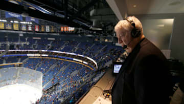 Nov 23, 2018; Buffalo, NY, USA; Buffalo Sabres play by play announcer Rick Jeanneret in the TV booth before announcing a game against the Montreal Canadiens at KeyBank Center. Mandatory Credit: Timothy T. Ludwig-USA TODAY Sports
