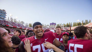 Walter Rouse #75 and teammates of the Stanford Cardinal (Photo by David Madison/Getty Images)